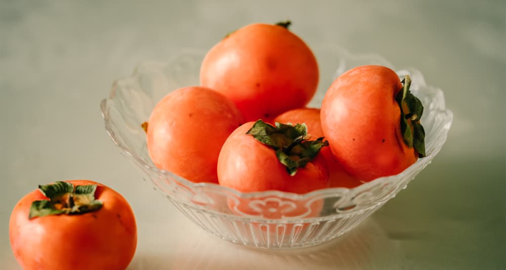 Foto ilustrativa do artigo: Cachorro pode comer caqui? ou faz mal?